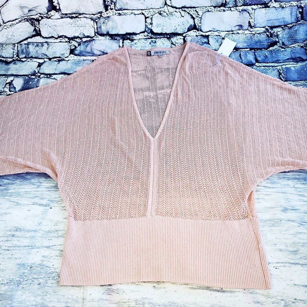Jennifer Lopez pink peekaboo crochet silver thread kimono sleeves